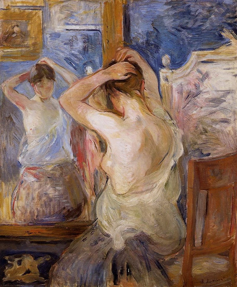 Nuda allo specchio